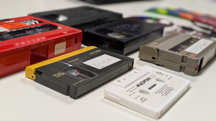 Selection of tape media arranged on a table
